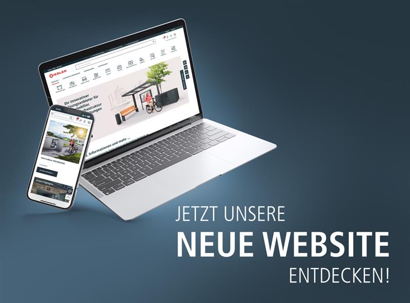 Laptop und Handy platziert vor einem dunklen Hintergrund, zeigen Ausschnitte der neuen Website