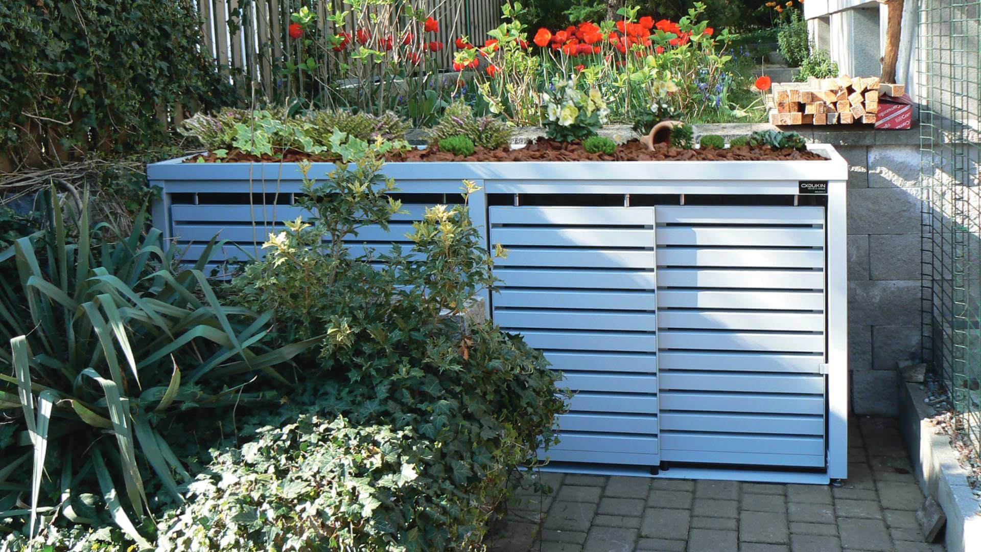 Mültbehälterschrank STYLEOUT LINIS in weißer Farboptik im Grünen