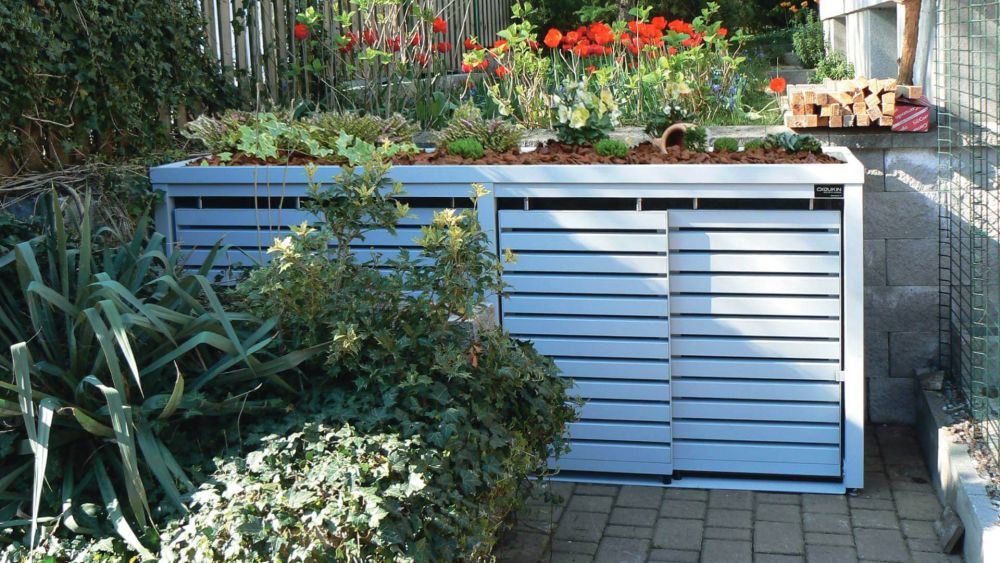 Mültbehälterschrank STYLEOUT LINIS in weißer Farboptik im Grünen